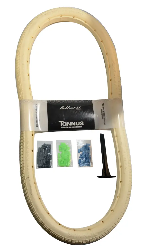 Tannus Aither 1.1 Airless Volle Buitenband Beige/Wit 26"x1.75" inclusief montage kit